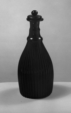 American. <em>Blue Perfume Bottle with Stopper</em>, 19th century. Glass, 5 7/8 x 1 3/8 in. (15 x 3.5 cm). Brooklyn Museum, Gift of Theodora Wilbour, 32.525.94a-b. Creative Commons-BY (Photo: Brooklyn Museum, 32.589_acetate_bw.jpg)