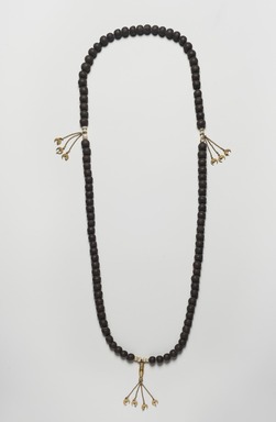  <em>Prayer Beads</em>, 19th century. Gilded copper, pearls, and tinted seeds, 29 1/2 in. (74.9 cm). Brooklyn Museum, Gift of Mrs. Lyman Underwood, 33.174. Creative Commons-BY (Photo: Brooklyn Museum, 33.174_PS11.jpg)