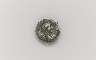 Greek or Roman. <em>Tetradrachm of Hadrian</em>, 138 C.E. Silver, 11/16 x 3/4 x 1/16 in. (1.7 x 1.9 x 0.1 cm). Brooklyn Museum, Charles Edwin Wilbour Fund, 33.417.10. Creative Commons-BY (Photo: Brooklyn Museum, 33.417.10.at_front_PS1.jpg)