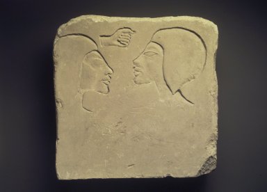  <em>Trial Piece with Two Heads</em>, ca. 1352-1336 B.C.E. Limestone, 9 3/8 × 9 5/16 × 2 1/2 in. (23.8 × 23.6 × 6.4 cm). Brooklyn Museum, Charles Edwin Wilbour Fund, 33.61. Creative Commons-BY (Photo: Brooklyn Museum, 33.61.jpg)