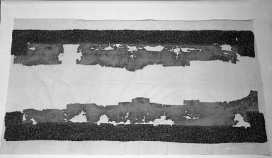 Paracas Necropolis "linear". <em>Mantle Border or Mantle, Fragments, Border</em>, 100 B.C.E.–100 C.E. Cotton, camelid fiber, a: 102 3/4 x 16 1/8 in. (261.0 x 41.0 cm) plus fringes. Brooklyn Museum, Alfred W. Jenkins Fund, 34.1541a-b. Creative Commons-BY (Photo: Brooklyn Museum, 34.1541a-b_acetate_bw.jpg)