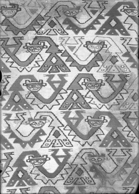 Nasca. <em>Mantle, Fragment or Textile Fragment, Undetermined</em>, 200-600. Cotton, camelid fiber, 5 1/8 x 18 1/8 in. (13 x 46 cm). Brooklyn Museum, George C. Brackett Fund, 34.554. Creative Commons-BY (Photo: Brooklyn Museum, 34.554_glass_bw.jpg)