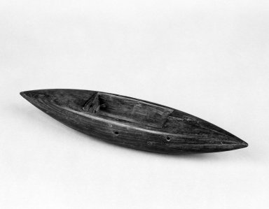 Native American (unidentified). <em>Small Model of Boat</em>. Wood, iron, 9 13/16 x 2 3/16 in.  (25.0 x 5.5 cm). Brooklyn Museum, Gift of Dr. Clark Burnham, 34.5603.2. Creative Commons-BY (Photo: Brooklyn Museum, 34.5603.2_bw.jpg)