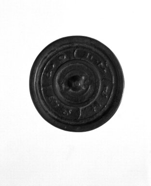  <em>Mirror</em>. Bronze, diameter: 2 7/16 in. (6.2 cm). Brooklyn Museum, Brooklyn Museum Collection, 34.5854. Creative Commons-BY (Photo: Brooklyn Museum, 34.5854_bw.jpg)