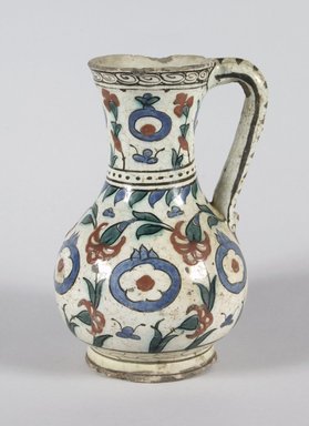  <em>Jug</em>, 17th century. Ceramic; fritware, painted in black, cobalt blue, green, and red on a white slip ground under a transparent glaze, 8 3/8 x 5 1/2 in. (21.3 x 14 cm). Brooklyn Museum, Brooklyn Museum Collection, 34.6030. Creative Commons-BY (Photo: Brooklyn Museum, 34.6030_PS5.jpg)