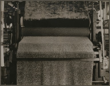 Lewis Wickes Hine (American, 1874–1940). <em>An Embossing Machine</em>, 1933. Gelatin silver print, image: 10 1/2 x 13 1/2 in. (26.7 x 34.3 cm). Brooklyn Museum, Gift of Shelton Looms, 34.6091.23 (Photo: Brooklyn Museum, 34.6091.23_PS11.jpg)