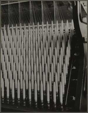 Lewis Wickes Hine (American, 1874–1940). <em>Through the Threads</em>, 1933. Gelatin silver print, image: 13 1/2 x 10 1/2 in. (34.3 x 26.7 cm). Brooklyn Museum, Gift of Shelton Looms, 34.6091.6 (Photo: Brooklyn Museum, 34.6091.6_PS11.jpg)