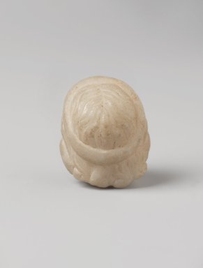  <em>Head of Asklepios</em>, 4th century B.C.E. Marble, 1 3/4 × 1 7/16 × 1 1/2 in. (4.5 × 3.6 × 3.8 cm). Brooklyn Museum, Charles Edwin Wilbour Fund, 34.713. Creative Commons-BY (Photo: , 34.713_back_PS11.jpg)
