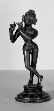  <em>Small Figure of Krishna Bamsidhara or Venugopala</em>, 18th century. Brass, 8 1/16 x 2 7/16 x 3 3/8 in. (20.5 x 6.2 x 8.5 cm). Brooklyn Museum, Brooklyn Museum Collection, 34.737. Creative Commons-BY (Photo: Brooklyn Museum, 34.737_acetate_bw.jpg)