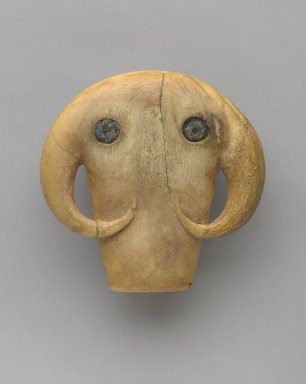  <em>Amulet in the Form of an Elephant’s Head</em>, ca. 3500-3100 B.C.E. Ivory, frit, 1 15/16 x 1 7/8 in. (4.9 x 4.7 cm). Brooklyn Museum, Charles Edwin Wilbour Fund, 35.1270. Creative Commons-BY (Photo: Brooklyn Museum, 35.1270_front_PS6.jpg)