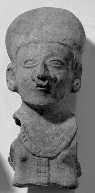  <em>Head with Elongated Headdress</em>, ca. 300 B.C.E.-600 C.E. Ceramic, 6 11/16 × 3 1/8 in. (17 × 8 cm). Brooklyn Museum, Ella C. Woodward Memorial Fund, 35.1670. Creative Commons-BY (Photo: Brooklyn Museum, 35.1670_acetate_bw.jpg)