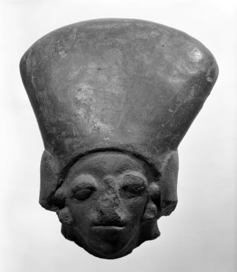  <em>Head with Elongated Headdress</em>. Clay Brooklyn Museum, Ella C. Woodward Memorial Fund, 35.1681. Creative Commons-BY (Photo: Brooklyn Museum, 35.1681_bw.jpg)