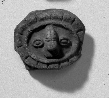  <em>Face of Jaguar Sun God</em>. Clay Brooklyn Museum, Gift of Dr. Ernest Franco, 35.1814. Creative Commons-BY (Photo: Brooklyn Museum, 35.1814_acetate_bw.jpg)