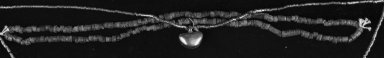 <em>Jade Necklace made up of Small Cylindrical Beads</em>. Jade, 24 7/16in. (62cm). Brooklyn Museum, Alfred W. Jenkins Fund, 35.197. Creative Commons-BY (Photo: Brooklyn Museum, 35.197_acetate_bw.jpg)