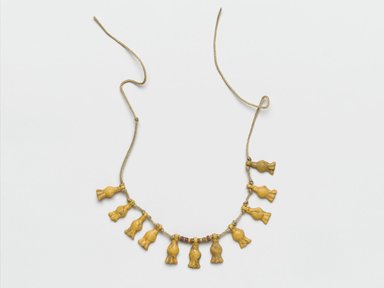  <em>Fragmentary Necklace with Cornflowers</em>, ca. 1352–1336 B.C.E. Faience, 7/16 × 1/8 × 3 3/8 in. (1.1 × 0.3 × 8.6 cm). Brooklyn Museum, Gift of the Egypt Exploration Society, 35.2023. Creative Commons-BY (Photo: Brooklyn Museum, 35.2023_PS2.jpg)