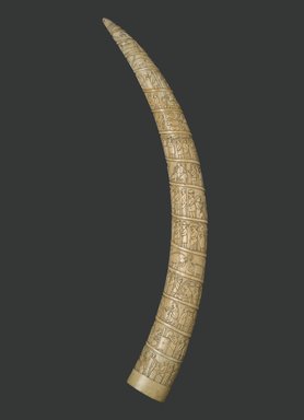 Vili. <em>Elephant Tusk Carved with Figures in Relief</em>, late 19th century. Ivory, graphite, 39 x 4 3/8 x 8 x 4 in. (99.1 x 11.1 x 20.3 x 10.2 cm). Brooklyn Museum, A. Augustus Healy Fund, 35.679. Creative Commons-BY (Photo: Brooklyn Museum, 35.679_view1_PS1.jpg)