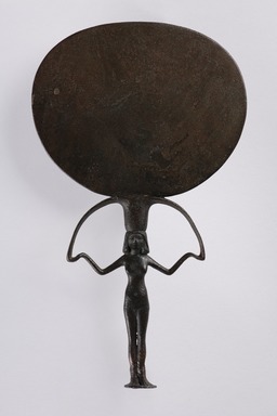  <em>Mirror</em>, ca. 1478–1352 B.C.E. Bronze, 7 3/4 × 4 3/4 × 1/2 in. (19.7 × 12 × 1.2 cm). Brooklyn Museum, Charles Edwin Wilbour Fund, 35.883. Creative Commons-BY (Photo: Brooklyn Museum, 35.883_front_PS20.jpg)