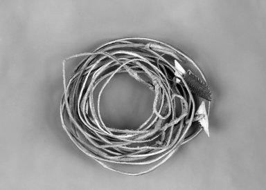 Alaska Native. <em>Fishing Line and Hook</em>, 1900–1930. Hide, bone, overall bundle (approximate): 3 1/2 x 4 x 1/2 in. (8.9 x 10.2 x 1.3 cm); hook height: 1 in. (2.5 cm). Brooklyn Museum, Gift of Frank K. Fairchild, 36.102. Creative Commons-BY (Photo: Brooklyn Museum, 36.102_bw.jpg)