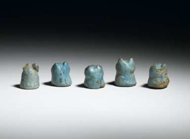  <em>Lion-Headed Gaming Piece, 1 of 5</em>, ca. 1938-1630 B.C.E. Faience, 7/8 x 5/8 in. (2.2 x 1.6 cm). Brooklyn Museum, Charles Edwin Wilbour Fund, 36.3.1. Creative Commons-BY (Photo: , 36.3.1_36.3.2_36.3.3_36.3.4_36.3.5_back_PS2.jpg)