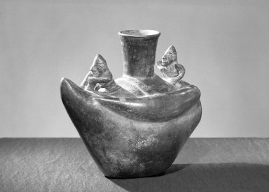 Chimú. <em>Vessel with Two Fishermen in a Reed Boat</em>, 1100-1470. Ceramic, 9 3/4 x 11 x 7 in. (24.8 x 27.9 x 17.8 cm). Brooklyn Museum, Gift of Mrs. Eugene Schaefer, 36.308. Creative Commons-BY (Photo: Brooklyn Museum, 36.308_acetate_bw.jpg)