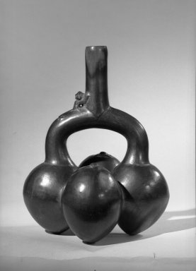 Chimú. <em>Stirrup Spout Vessel in Form of Four Gourds</em>, ca.1100-1400. Ceramic, 9 1/4 x 7 1/2 x 7 1/2 in. (23.5 x 19.1 x 19.1 cm). Brooklyn Museum, Gift of Mrs. Eugene Schaefer, 36.314. Creative Commons-BY (Photo: Brooklyn Museum, 36.314_acetate_bw.jpg)