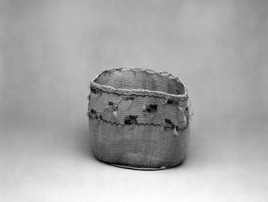 Aleut. <em>Decorated Basket</em>, 1900-1930. Straw, wool, feathers, 13 5/8 x 10 x 8 3/4 in. or (22.0 x 23.5 cm). Brooklyn Museum, Gift of Frederic B. Pratt, 36.503. Creative Commons-BY (Photo: Brooklyn Museum, 36.503_bw.jpg)