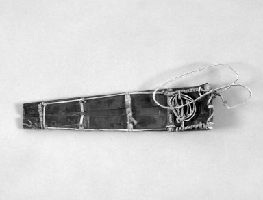 Alaska Native. <em>Model of Toboggan</em>, 1900-1930. Whale bone, whale hide, wood, 9 x 2 1/4 x 1 1/4 in. or (23.0 x 5.2 cm). Brooklyn Museum, Gift of Frank K. Fairchild, 36.73. Creative Commons-BY (Photo: Brooklyn Museum, 36.73_bw.jpg)