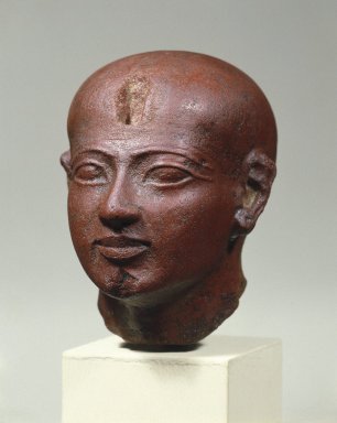  <em>High Priest as King (?)</em>, ca. 1070-945 B.C.E. Quartzite, 4 7/16 x 2 7/8 x 3 1/4 in. (11.3 x 7.3 x 8.3 cm). Brooklyn Museum, Charles Edwin Wilbour Fund, 36.835. Creative Commons-BY (Photo: Brooklyn Museum, 36.835_threequarter_SL1.jpg)