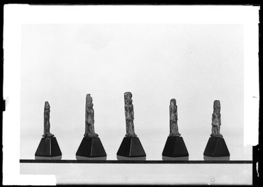 <em>Small Figure of Harmachis Standing</em>, 664-343 B.C.E. Faience, Height: 1 3/16 in. (3.1 cm). Brooklyn Museum, Charles Edwin Wilbour Fund, 37.1025E. Creative Commons-BY (Photo: , 37.1010E_37.1025E_37.1034E_37.1041E_37.1050E_GrpA_SL4.jpg)