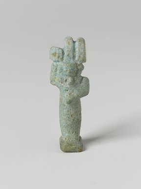  <em>Amun-Min Amulet</em>, 664–343 B.C.E. Faience, 1 3/4 x 5/8 x 9/16 in. (4.5 x 1.6 x 1.5 cm). Brooklyn Museum, Charles Edwin Wilbour Fund, 37.1035E. Creative Commons-BY (Photo: Brooklyn Museum, 37.1035E_PS4.jpg)