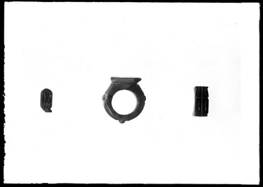  <em>Amulet in the Form of a Cartouche</em>, ca.1292-1075 B.C.E. Carnelian Brooklyn Museum, Charles Edwin Wilbour Fund, 37.1754E. Creative Commons-BY (Photo: , 37.1211E_37.1340E_37.1754E_GrpA_SL4.jpg)
