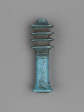  <em>Ded-Amulet</em>, 664-30 B.C.E. Faience, 1 13/16 x 5/8 x 7/16 in. (4.6 x 1.6 x 1.1 cm). Brooklyn Museum, Charles Edwin Wilbour Fund, 37.1278E. Creative Commons-BY (Photo: Brooklyn Museum, 37.1278E_front_PS2.jpg)