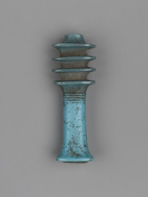  <em>Ded-Amulet</em>, 664–30 B.C.E. Faience, 1 13/16 x 5/8 x 7/16 in. (4.6 x 1.6 x 1.1 cm). Brooklyn Museum, Charles Edwin Wilbour Fund, 37.1278E. Creative Commons-BY (Photo: Brooklyn Museum, 37.1278E_front_PS2.jpg)