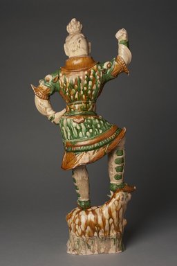 
                         Lokapala on a Recumbent Bull, 618-906. Earthenware with glaze, 29 1/4 x 13 in. (74.3 x 33 cm). Brooklyn Museum, By exchange, 37.129. Creative Commons-BY (Photo: Brooklyn Museum, 37.129_back_PS11.jpg)                      