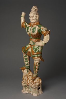  <em>Lokapala on a Recumbent Bull</em>, 618-906. Earthenware with glaze, 29 1/4 x 13 in. (74.3 x 33 cm). Brooklyn Museum, By exchange, 37.129. Creative Commons-BY (Photo: Brooklyn Museum, 37.129_threequarter_PS11.jpg)