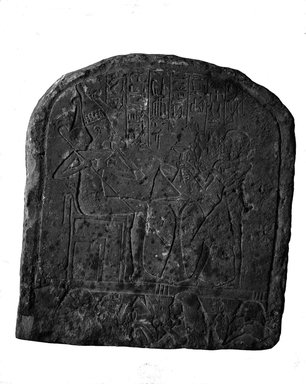  <em>Upper Part of Funerary Stela</em>. Limestone, gesso or plaster, 13 x 11 13/16 x 3 15/16 in. (33 x 30 x 10 cm). Brooklyn Museum, Charles Edwin Wilbour Fund, 37.1350E. Creative Commons-BY (Photo: Brooklyn Museum, 37.1350E_NegA_glass_bw_SL4.jpg)