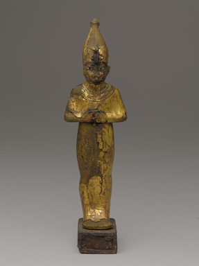 <em>Figure of Osiris</em>, 4th century B.C.E. or later. Wood, calcium ground, gold alloy leaf, copper alloy, polychromy, 8 15/16 x 2 1/2 x 1 7/8 in. (22.7 x 6.4 x 4.7 cm). Brooklyn Museum, Charles Edwin Wilbour Fund, 37.1375Ea-b. Creative Commons-BY (Photo: Brooklyn Museum, 37.1375Ea-b_PS9.jpg)