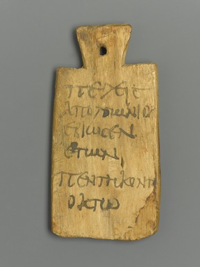 Nubian. <em>Mummy Tag with Greek Inscription</em>, 150-300 C.E. Wood, pigment, 4 1/2 x 2 5/16 x 3/8 in. (11.4 x 5.8 x 1 cm). Brooklyn Museum, Charles Edwin Wilbour Fund, 37.1396E. Creative Commons-BY (Photo: Brooklyn Museum, 37.1396E_front_PS1.jpg)
