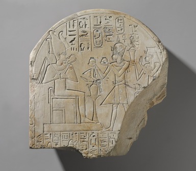  <em>Amunhotep I and Ahmose-Nofretary before Osiris</em>, ca. 1390–1352 B.C.E. Limestone, pigment (Egyptian blue, indigo), 11 1/2 × 11 × 3 3/4 in., 22.5 lb. (29.2 × 27.9 × 9.5 cm, 10.21kg). Brooklyn Museum, Charles Edwin Wilbour Fund, 37.1485E. Creative Commons-BY (Photo: , 37.1485E_PS9.jpg)