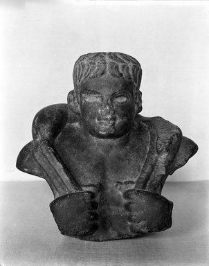 Egypto-Roman. <em>Head and Shoulders of Man Bearing Kid on Shoulders</em>, 395-642 C.E. Granite, 9 3/16 x 9 7/16 x 4 3/4 in. (23.4 x 24 x 12.1 cm). Brooklyn Museum, Charles Edwin Wilbour Fund, 37.1499E. Creative Commons-BY (Photo: Brooklyn Museum, 37.1499E_NegA_glass_bw.jpg)