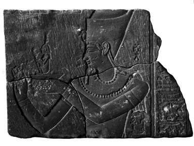 Egyptian. <em>Pharaoh Offering an Image of Ma`at</em>, 1st century B.C.E. Sandstone, 19 × 1 15/16 × 27 1/16 in. (48.3 × 5 × 68.7 cm). Brooklyn Museum, Charles Edwin Wilbour Fund, 37.1525E. Creative Commons-BY (Photo: Brooklyn Museum, 37.1525E_NegA_glass_bw_SL4.jpg)