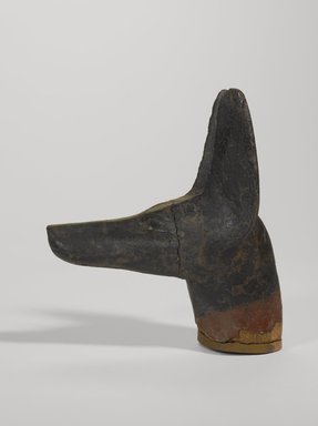  <em>Head of a Jackal</em>, ca. 1539 B.C.E. or later. Wood, stucco, pigment, 6 3/16 x 5 5/16 in. (15.7 x 13.5 cm). Brooklyn Museum, Charles Edwin Wilbour Fund, 37.1530E. Creative Commons-BY (Photo: Brooklyn Museum, 37.1530E_profile_PS9.jpg)