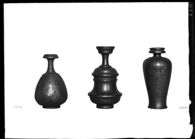  <em>Small Offering Vase</em>. Bronze, 4 15/16 x 2 3/4 in. (12.5 x 7 cm). Brooklyn Museum, Charles Edwin Wilbour Fund, 37.1556E. Creative Commons-BY (Photo: , 37.1539E_37.1542E_37.1556E_GrpA_SL4.jpg)
