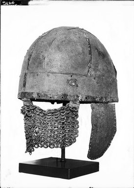 Roman. <em>Helmet</em>, 7th century C.E. Bronze, iron, 11 5/8 x 7 1/16 x Diam. 25 1/16 in. (29.5 x 18 x 63.7 cm). Brooklyn Museum, Charles Edwin Wilbour Fund, 37.1600E. Creative Commons-BY (Photo: Brooklyn Museum, 37.1600E_NegA_bw_SL1.jpg)