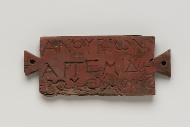  <em>Mummy Tag of Anoubion</em>, ca. 100-300 C.E. Wood, pigment, 3 9/16 × 11/16 × 8 11/16 in. (9 × 1.7 × 22 cm). Brooklyn Museum, Charles Edwin Wilbour Fund, 37.1895E. Creative Commons-BY (Photo: Brooklyn Museum, 37.1895E_front_PS11.jpg)