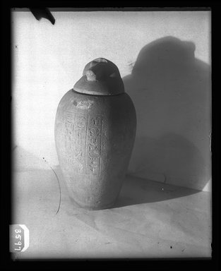  <em>Canopic Jar with Cover</em>, 664–332 B.C.E. Limestone, 37.1899Ea: 9 7/16 x diam. 6 7/8 in. (24 x 17.5 cm). Brooklyn Museum, Charles Edwin Wilbour Fund, 37.1899Ea-b. Creative Commons-BY (Photo: Brooklyn Museum, 37.1899Ea-b_NegA_SL4.jpg)