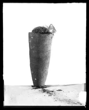  <em>Ibis-form Mummy in Jar</em>, 664-332 B.C.E. Clay, animal remains, linen, 13 × 5 × 5 1/2 in. (33 × 12.7 × 14 cm). Brooklyn Museum, Charles Edwin Wilbour Fund, 37.1953Ea-b. Creative Commons-BY (Photo: Brooklyn Museum, 37.1953Ea-b_NegA_SL4.jpg)