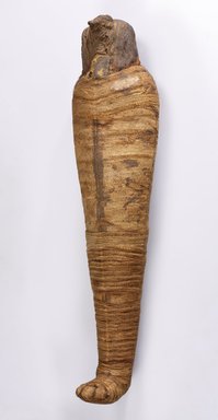  <em>Ibis Mummy</em>, 760-399 B.C.E. Animal remains, linen, 30 × 7 5/8 × 5 1/2 in. (76.2 × 19.4 × 14 cm). Brooklyn Museum, Charles Edwin Wilbour Fund, 37.1990E. Creative Commons-BY (Photo: Brooklyn Museum (Gavin Ashworth,er), 37.1990E_Gavin_Ashworth_photograph.jpg)