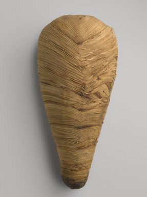  <em>Ibis Mummy</em>, 664–30 B.C.E. Animal remains, linen, 15 11/16 × 7 1/2 × 6 in. (39.8 × 19.1 × 15.2 cm). Brooklyn Museum, Charles Edwin Wilbour Fund, 37.2042.7E. Creative Commons-BY (Photo: Brooklyn Museum, 37.2042.7E_PS9.jpg)