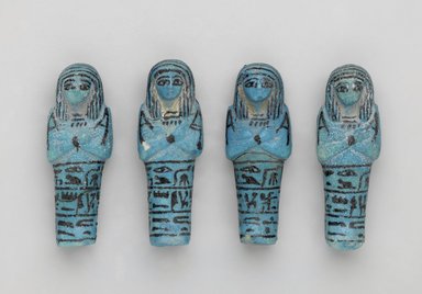  <em>Shabty of Princess Muthotep</em>, ca. 945–712 B.C.E. Faience, 3 3/4 x 1 1/4 x 1 in. (9.5 x 3.2 x 2.5 cm). Brooklyn Museum, Charles Edwin Wilbour Fund, 37.205E. Creative Commons-BY (Photo: , 37.205E-.208E_front_PS2.jpg)